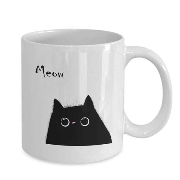 A black and white cat mug with Meow quote on Amazon