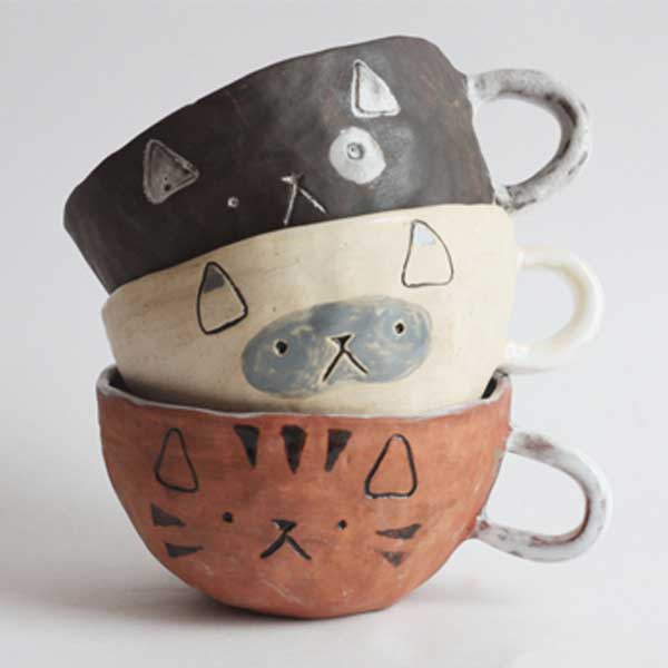 A set of hand made cat cups on Etsy for cat lovers and owners