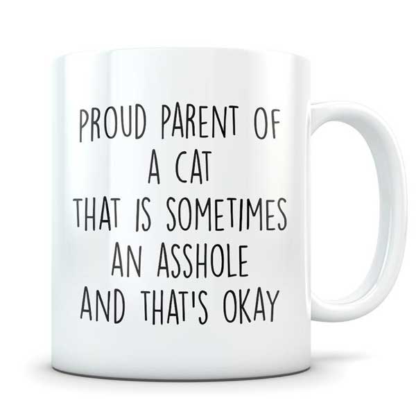 A cute white coffee mug for cat parents on Etsy