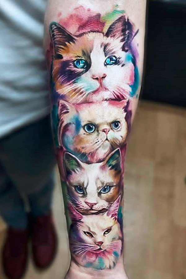 Colour tattoo of cat faces by VINNI MATTOS TATTOO