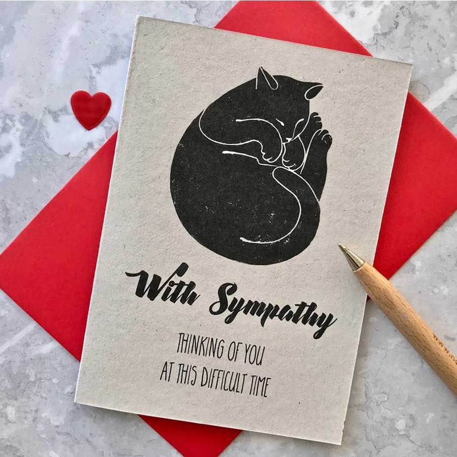 A cat sympathy card with a black sleeping cat and words thinking of you as this difficult time