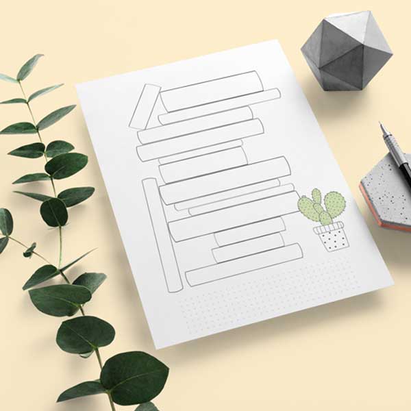 A digital book tracker template with green leaves, pen, and a grey cube