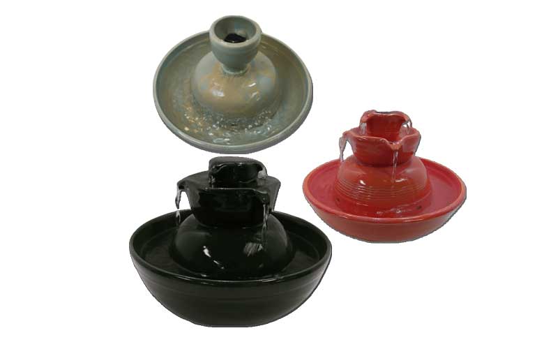 Gray, black, and red porcelain cat fountains
